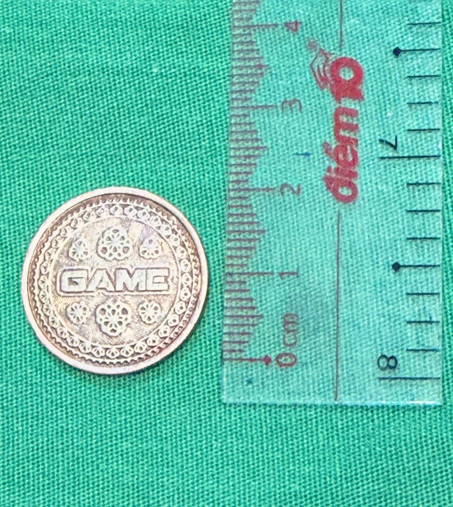 Hình ảnh đồng xu 22mm được lấy ra